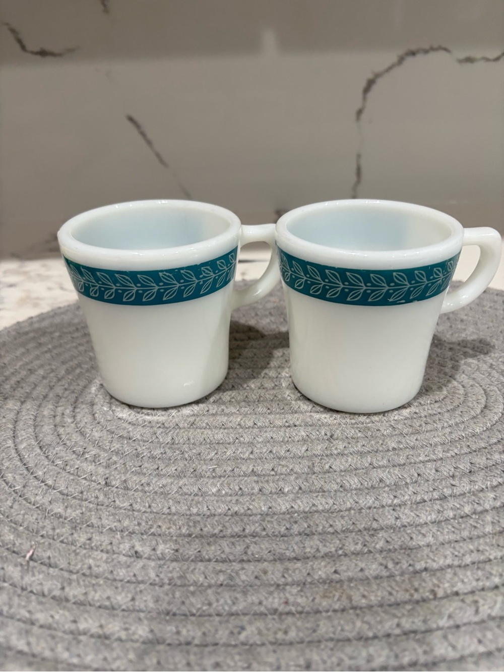 White Pyrex Milk Glass Mugs with Teal Leaf Band - Set of 2